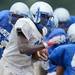 Lincoln football players run a drill during a practice at the school on Thursday. Melanie Maxwell I AnnArbor.com